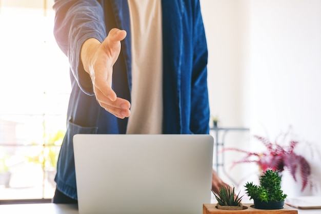 Businessman open hand to shaking hands