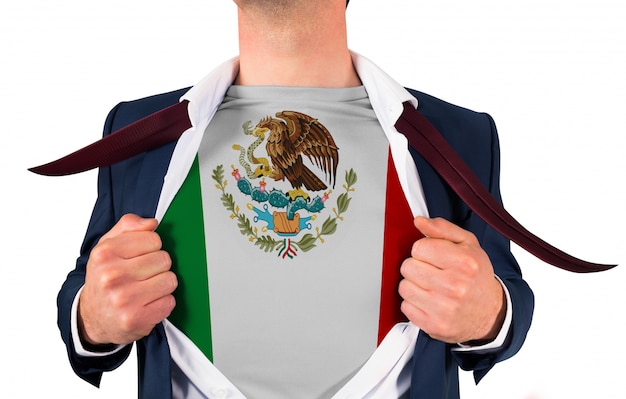 Businessman opening shirt to reveal mexico flag