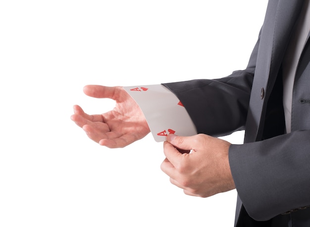 Businessman out of sleeve a poker card