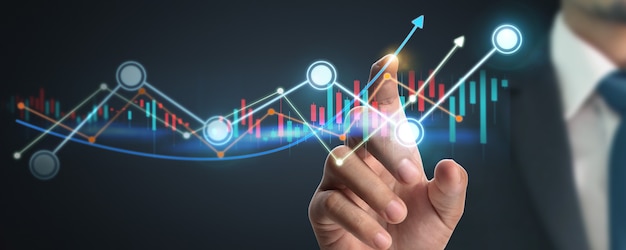 Businessman plan graph growth and increase of chart positive indicators in his business