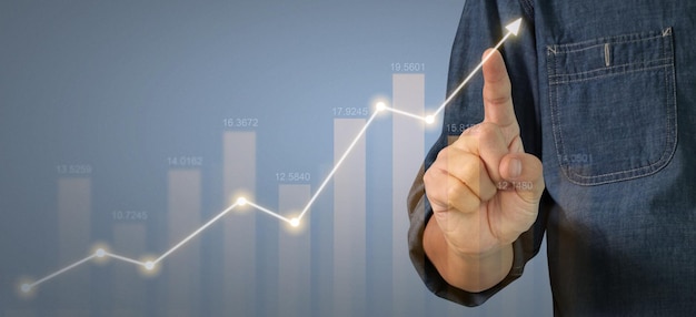 Businessman plan graph growth and increase of chart positive
indicators