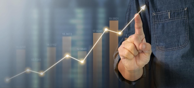 Businessman plan graph growth and increase of chart positive indicators