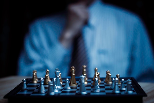 Businessman playing chess think problem solving business competition planning teamworkInternational chess ideas and competition and strategy business success conceptstrategic conceptx9