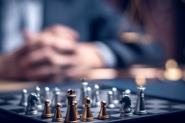 Photo businessman playing chess think problem solving business competition planning teamworkinternational chess ideas and competition and strategy business success conceptstrategic conceptx9