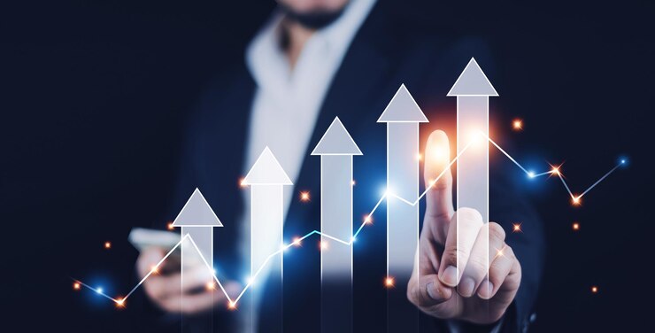 Businessman pointing arrow graph corporate future success and growing growth concept