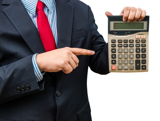 Businessman pointing to calculator on white background