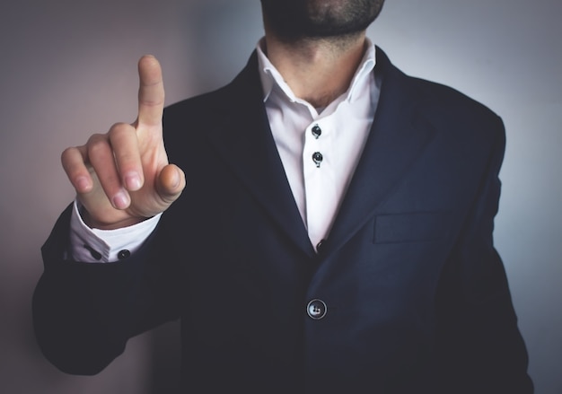 Photo businessman pointing finger