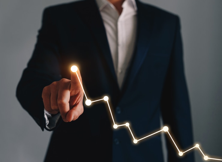Photo businessman pointing graph growth plan of business