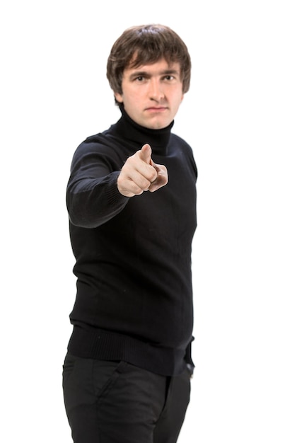 Businessman pointing his finger against white background