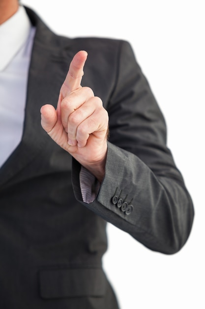 Businessman pointing his finger at camera