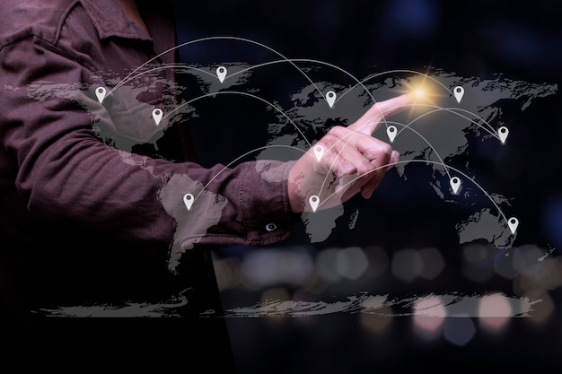 Businessman pointing spot on the global connection lines, Business network concept.