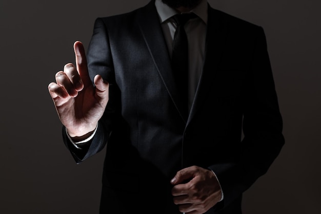 Businessman Pointing With One Finger On Important Messages Executive In Suit Presenting Crutial Informations Gentleman Showing Critical Announcement