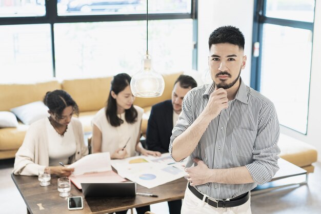 Businessman posing in the office