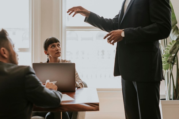 Businessman presenting the strategy to his team