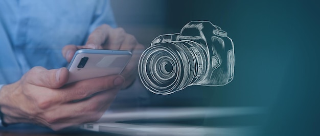 Businessman presses on the phone on a hand-drawn camera