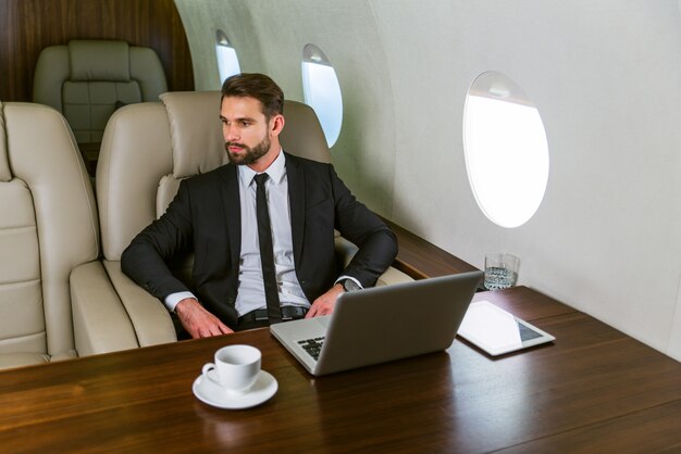 Businessman on private jet