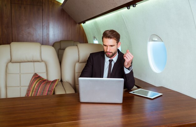 Businessman on private jet