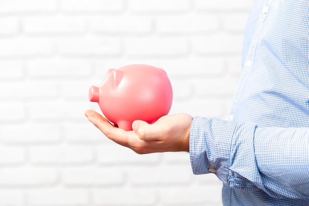 Businessman protecting his savings