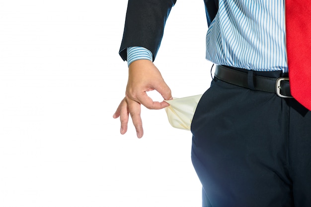 Businessman Pulling out Empty Pocket Isolated on white