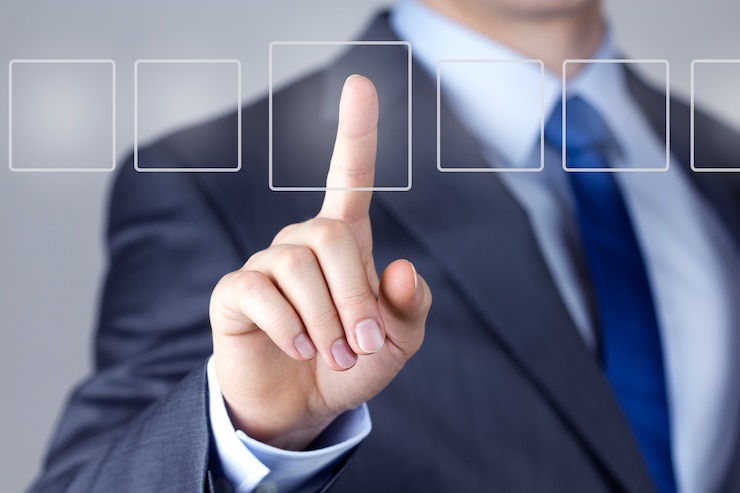 Photo businessman pushing on a touch screen interface