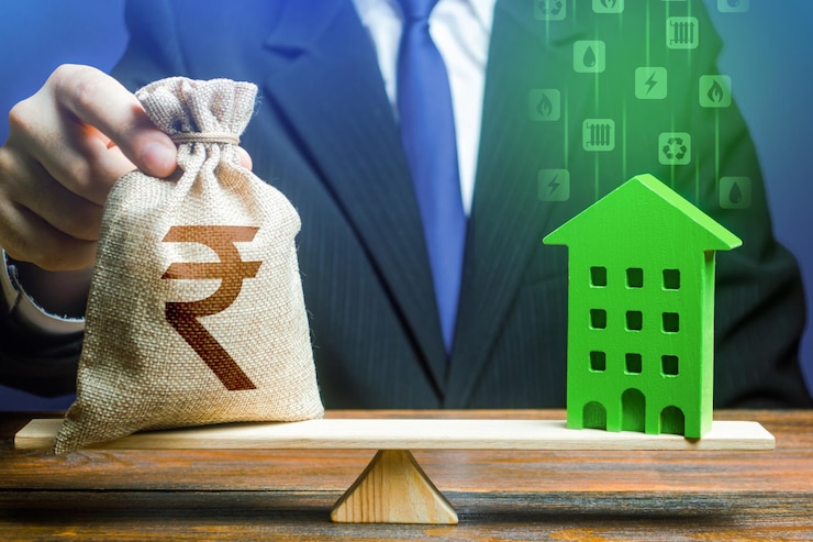 फोटो businessman puts indian rupee money bag on scales and green house investment in renovation