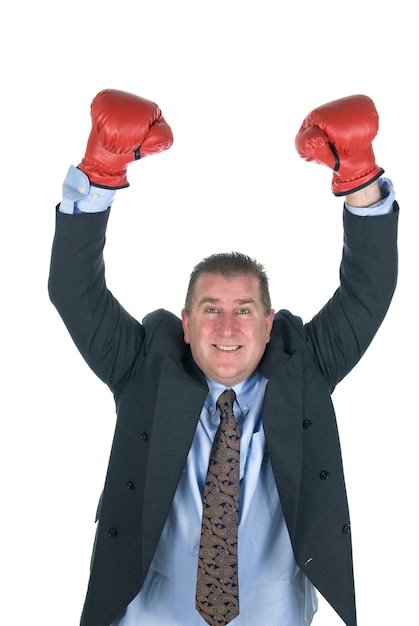 Foto un uomo d'affari ha alzato le braccia in segno di vittoria durante le trattative contrattuali
