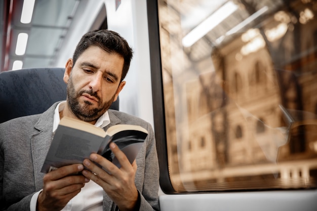 Businessman reading a book