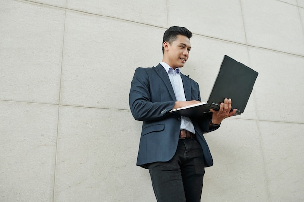 Businessman reading e-mails