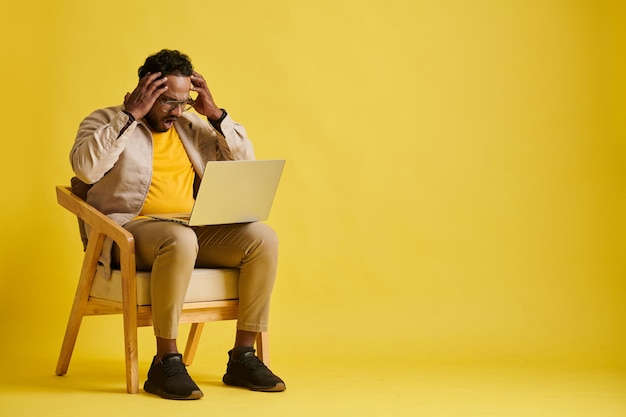 Businessman Reading Email from Client