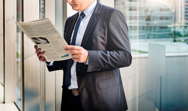 Businessman reading the financial news