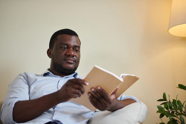 Businessman Reading Popular Novel