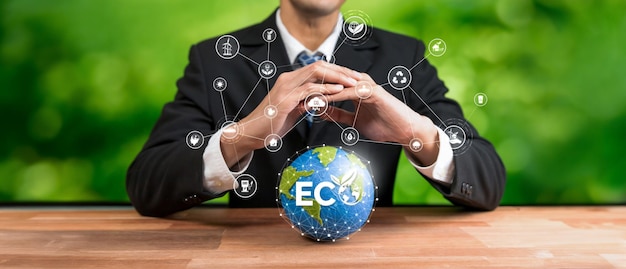 Businessman's hand holding earth globe symbolize corporate commitment to esg to reduce carbon emission adopt eco friendly business to minimize environment impact for net zero world panorama reliance