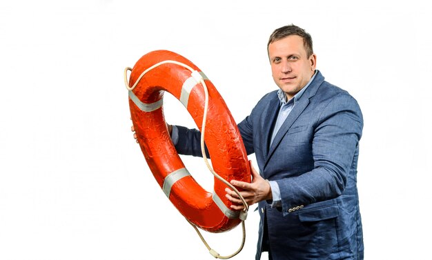 Businessman saving colleague with lifebuoy