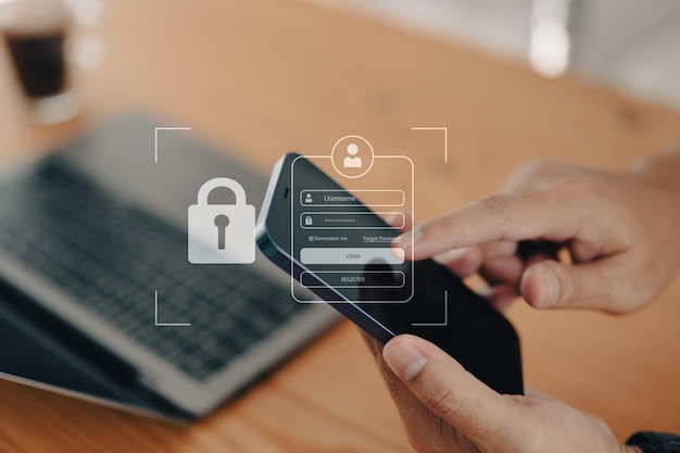 ビジネスマンは、ハッキング・フィッシングやオンライン・セキュリティの脅威から保護し、スマートフォンを保護し、オンライン詐欺に対して警戒を続けるという携帯電話のコンセプトでアカウントを保護します