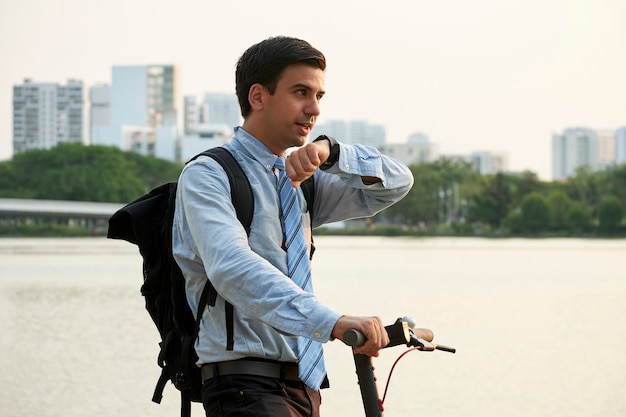 Businessman setting destination point via smart watch