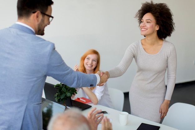 Businessman shaking hands to seal a deal 