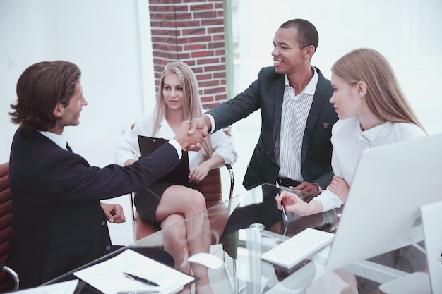 Businessman shaking partner hand after successful negotiations