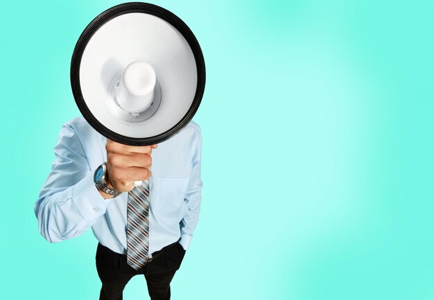 Businessman shouting in a megaphone