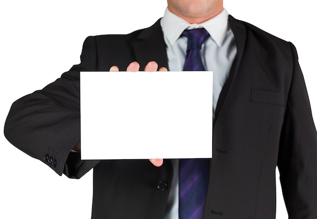 Businessman showing blank white card