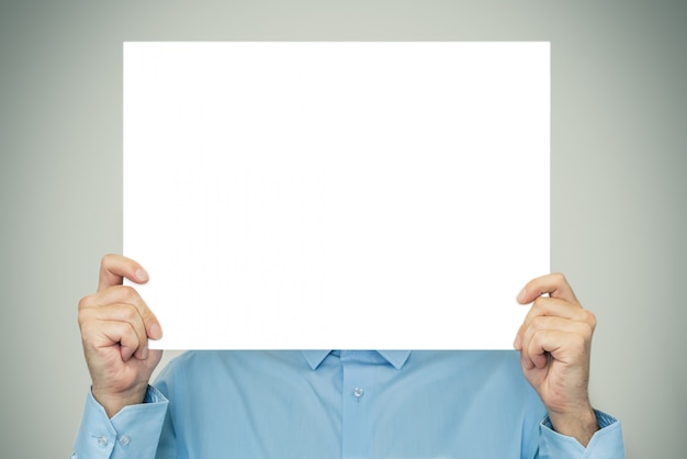 businessman showing on blank white sheet