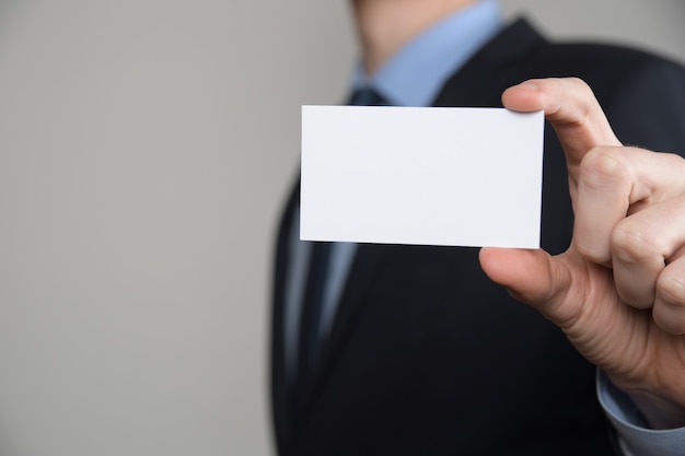 Businessman showing business card