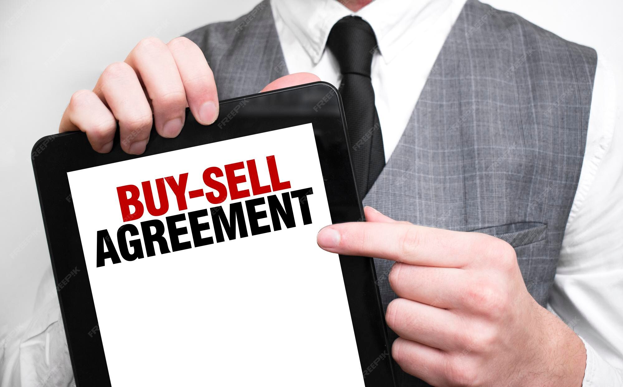 Premium photo businessman showing business concept on tablet standing