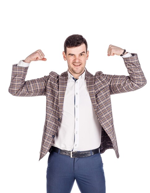 Businessman showing his biceps emotions facial expressions feelings body language signs image on a white studio background