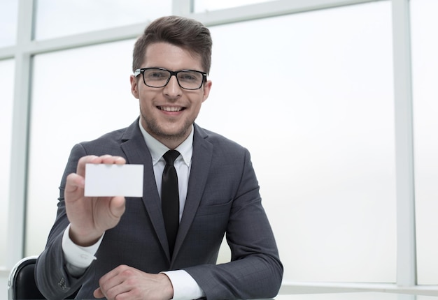 Businessman showing his business card business concept