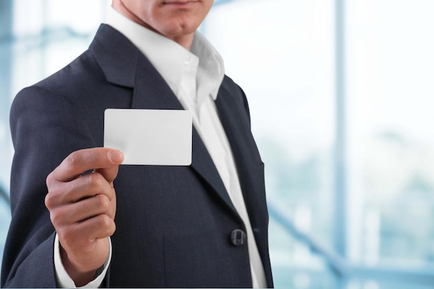 Businessman showing his business card