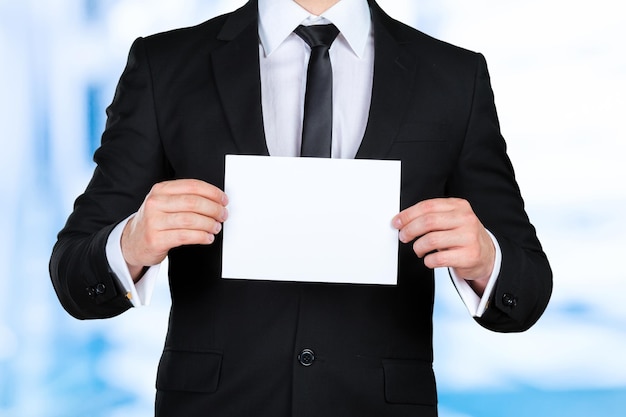 Businessman showing his business card