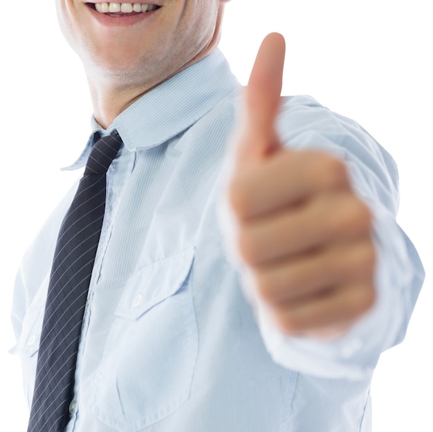 Businessman showing thumbs up