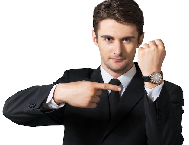 Businessman showing the time on his wrist watch