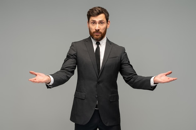 Businessman shrugging off against white background Dont know hands pose man business businessman understanding concept