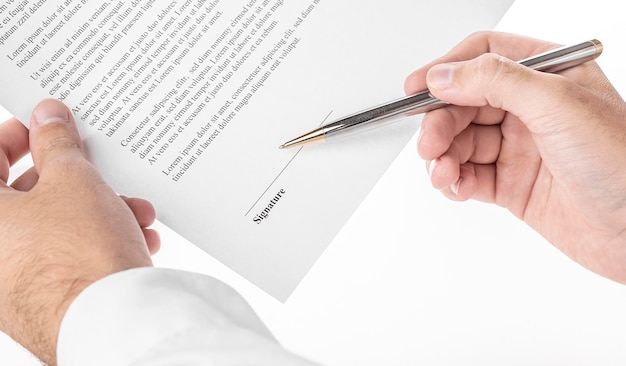 Photo businessman signing a document